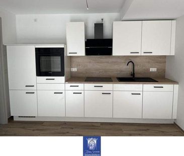 Wohlfühlwohnung mit Balkon und moderner Ausstattung im Erstbezug! R... - Foto 4