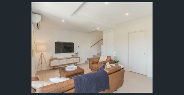 BOUTIQUE APARTMENT LIVING AT ITS BEST - Photo 1