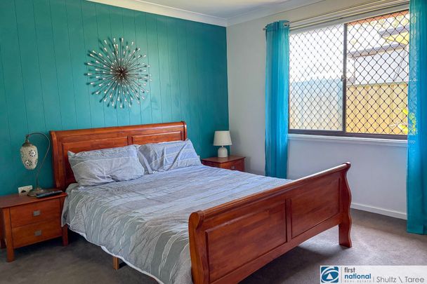 Stylish Family Home with Backyard Paradise - Photo 1