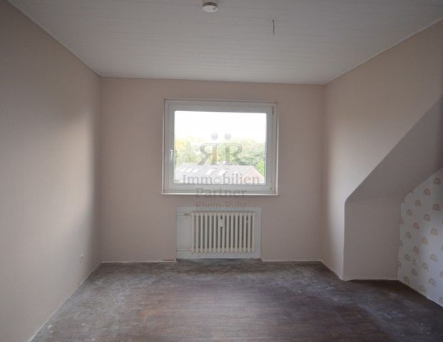 Helle, gut geschnittene Wohnung mit Gartennutzung.WBS erforderlich! - Foto 1