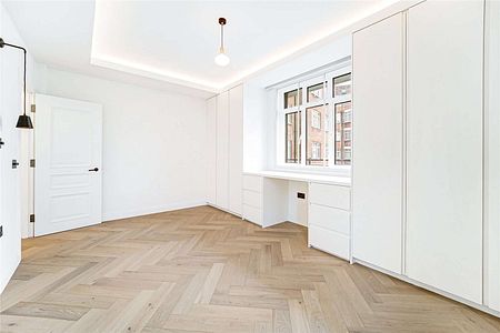 This is a beautifully refurbished 3 bedroom, 3 bathroom lateral flat in a popular mansion block in the heart of South Kensington. - Photo 4