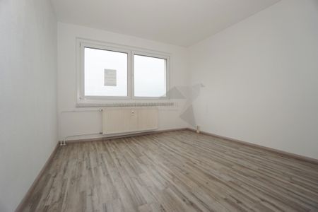 Gemütliche 3-Zimmer-Wohnung mit Balkon in ruhiger, grüner Lage - Foto 4