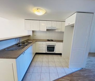 Split Level 2 Bedroom Townhouse With Open Car Space! - Photo 5