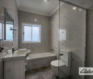 Freshly Updated Family Home in a Convenient Regents Park Location - Photo 5