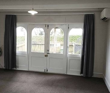 Freshly painted two bedroom Terrace house with a carport. - Photo 4
