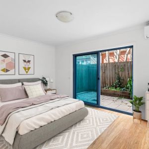 Beachside Living with Two Private Courtyards! - Photo 2