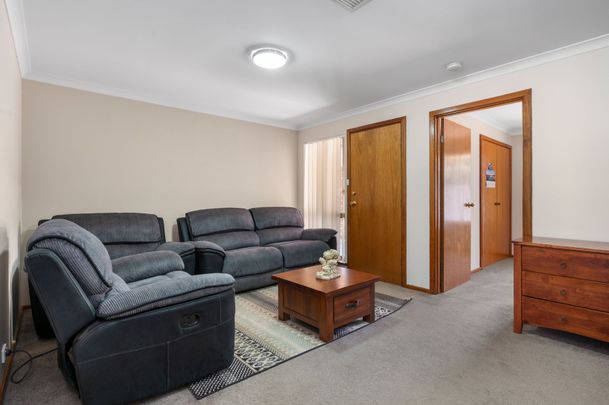 Neat, Tidy & Centrally Located – The Perfect Low-Maintenance Home - Photo 1