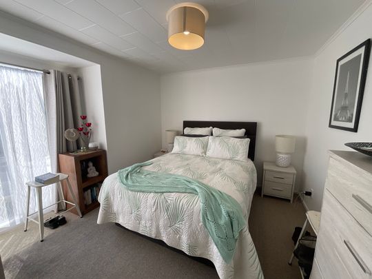 TIDY AND INVITING THREE BEDROOM HOME - Photo 1