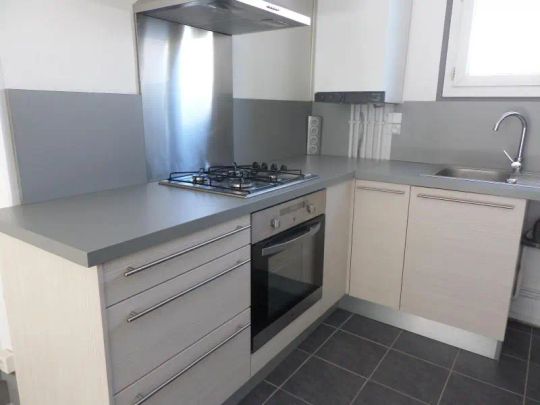 Appartement à louer 4 pièces 64m² - Photo 1