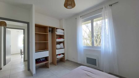Location - Appartement T3 bis de 94 m² avec terrasse et jardin - Photo 4