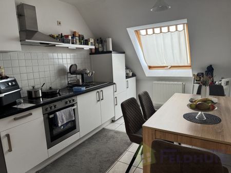 Gemütliche 2-Zimmer-Oberwohnung mit ausgebauten Spitzboden in Moormerland-Veenhusen! - Photo 4