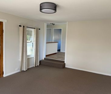 Freshly Renovated Beachside Living with Water Views - Photo 5