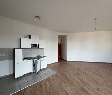 Charmantes 1-Zimmer-Apartment mit Einbauküche - Photo 2