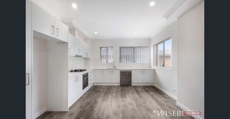 NEWLY RENOVATED SPACIOUS UNIT! - Photo 3