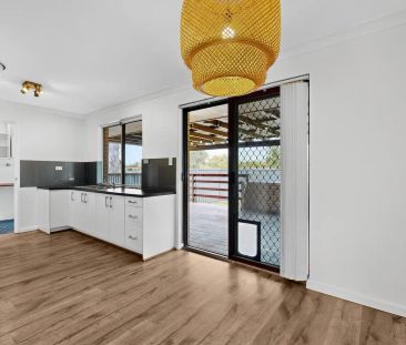 “Bright & Breezy Family Gem with Outdoor Entertaining!” - Photo 1