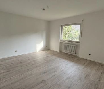 Modernisierte, lichtdurchflutete Erdgeschosswohnung mit Wintergarte... - Foto 3