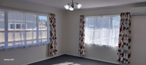 Sunny Two Bedroom Townhouse - Photo 1