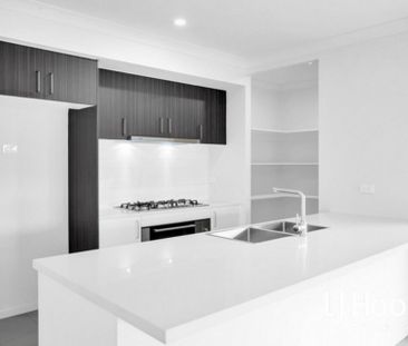 STUNNING FAMILY HOME IN FLAGSTONE WITH DUCTED AIR + QUALITY FINISHES! - Photo 5