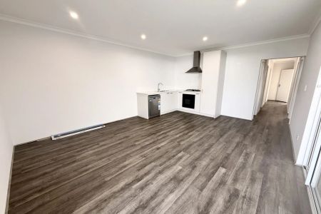 Low-Maintenance Brand New 2x1 Home Just Minutes from the Beach! - Photo 3