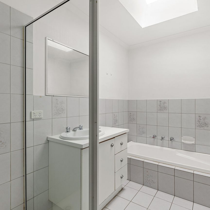 Comfort & Convenience with a Private Yard - Photo 1