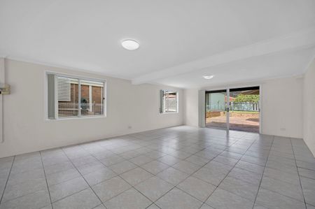 A charming home set on a generous block with a sprawling backyard. - Photo 5