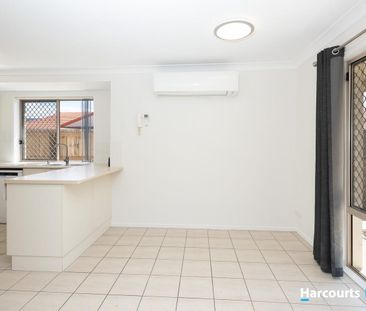 Freshly Updated Low-Set Villa with Pool Access & Easy-Care Living - Photo 5