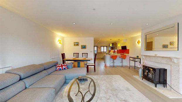 A bright and spacious home offering versatile living accommodation arranged over three floors, and enjoying unrivalled views across the River Thames to Windsor Castle. - Photo 1