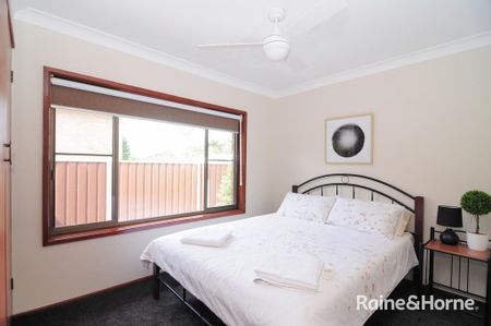 coastal living meets space and comfort in this family home - Photo 5