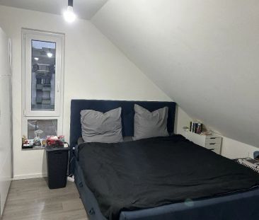 Schicke 2-Zimmer-Dachgeschosswohnung mit Westbalkon und Pkw-Stellpl... - Foto 3