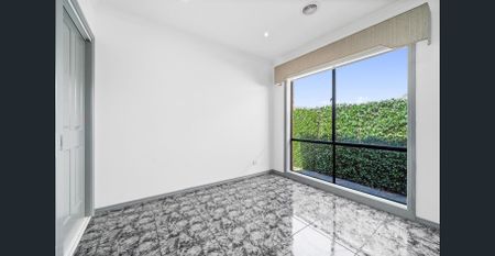 Stunning Family Home in Roxburgh Park with Multiple Living - Photo 4