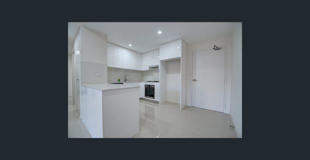 Spacious two bedroom apartment with open plan living - Photo 1