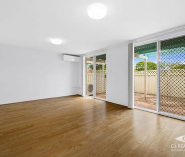 Quality Full Brick Townhouse in a Prime Lifestyle Location - Photo 1