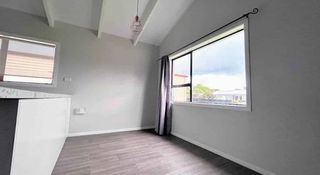 Three-Bedroom Home with Modern Open-Plan Living - Photo 2