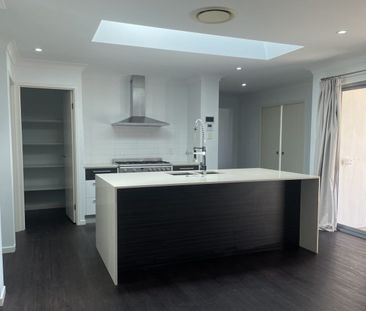 FULLY FENCED MODERN HOME IN AN IDEAL LOCATION - Photo 5