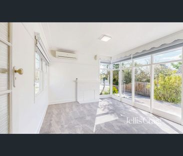 Beautifully Renovated Home with Multiple Living Spaces & Expansive ... - Photo 3