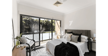 Stylish Two-Bedroom Townhouse with Double Lock Up Garage - Photo 4