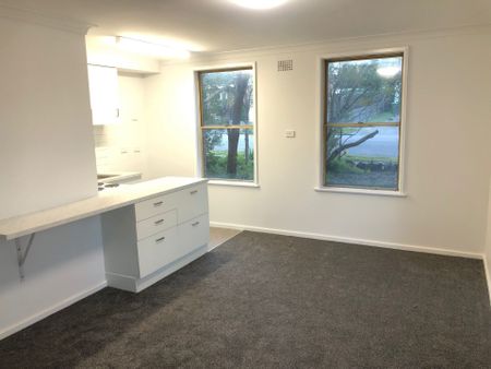 One bedroom unit with single carport - Photo 5