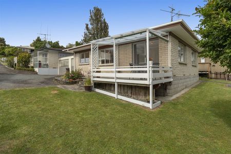 This brick and tile rear unit is in such an excellent location - Photo 2