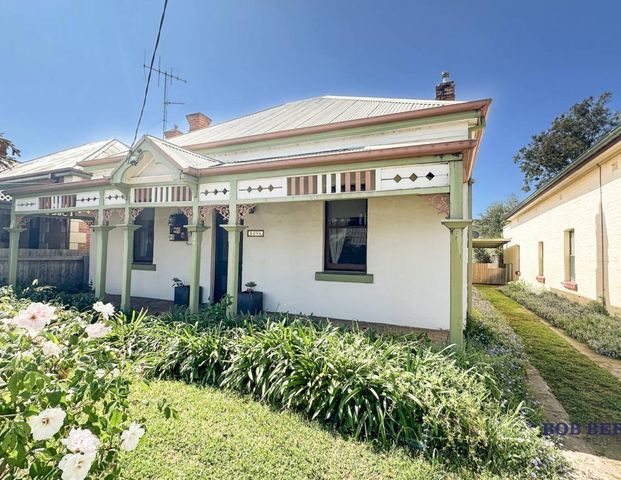 Fully Furnished Three Bedroom Home with Lawn Maintenance Included - Photo 1