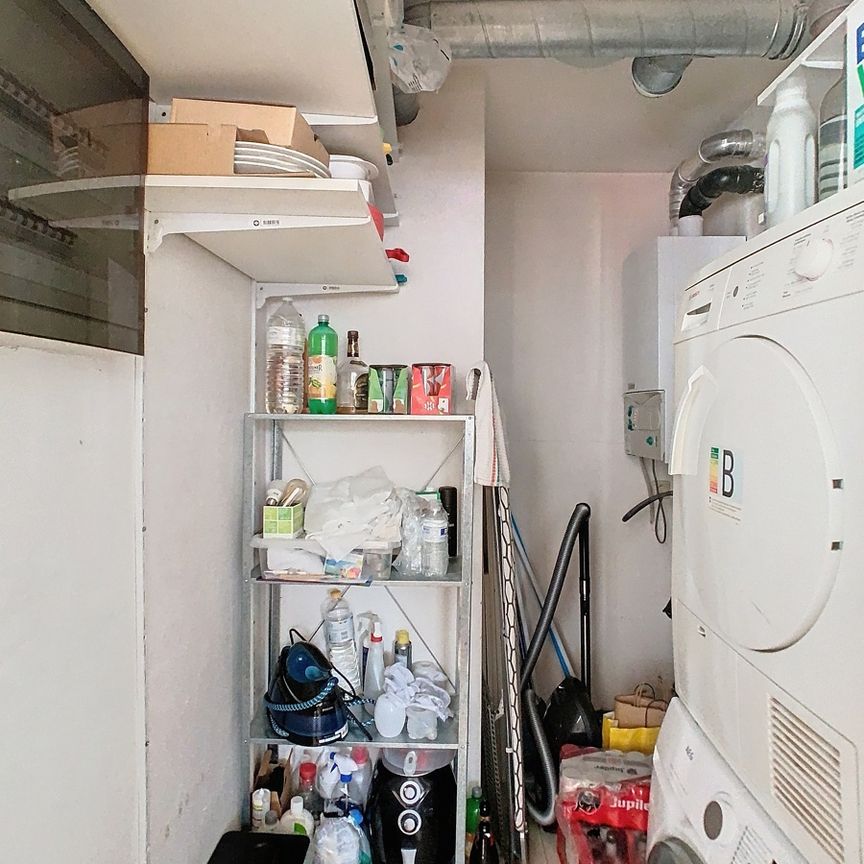 Mooi afgewerkt 2-slaapkamer appartement met 2 terrassen en gesloten garagebox. - Foto 1