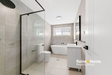 Modern Family Home with Spacious Living & Outdoor Entertaining - Photo 5