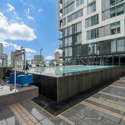 Feels brand new entertainment district outdoor pool! - Photo 1