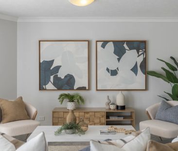 North-east facing beachside apartment with double parking - Photo 1