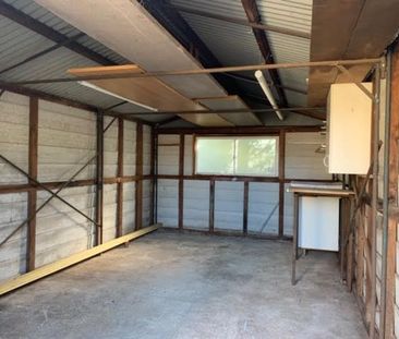 Charming Family Home with Spacious Backyard and Modern Comforts - Photo 4