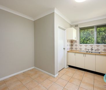 TOP FLOOR LIVING WITH WRAP-AROUND BALCONY - Photo 4