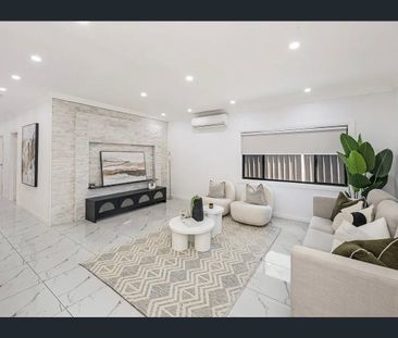 Modern 4-Bedroom Family Living with Space, Style & Convenience - Photo 1