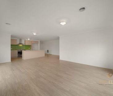 4-Bedroom Home with Multiple Living Areas - Photo 1