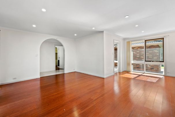 Spacious Four-Bedroom Home with Gardening Included - Photo 1