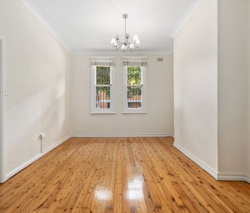 Three-Level Renovated Home with Private Courtyard - Photo 3