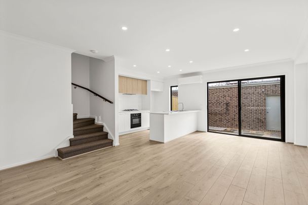 Brand New with 3 Bathrooms! - Photo 1